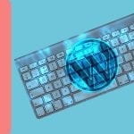 A picture of a keyboard with the wordpress logo over the top. The whole photo has a blue hue over the top.